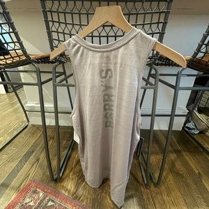 Barry’s Nike - tank top MD size BUT fits like a small in my opinion 😕 NWT